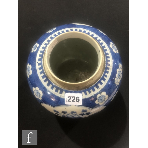 226 - A Chinese 19th Century blue and white jar, the cracked ice ground picked out with lotus blooms, the ... 