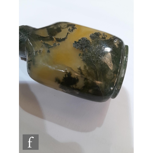 164 - A collection of late Qing Dynasty (1644-1912) snuff bottles, to include a moss agate example with a ... 