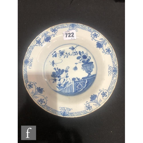 84 - Three assorted 19th Century tin glazed plates decorated in blue and white with Chinoiserie roundels,... 