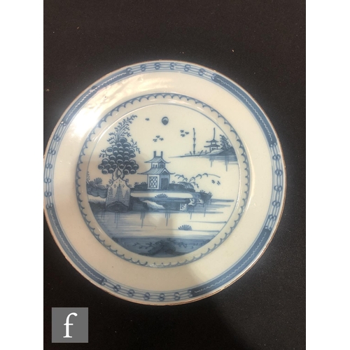 84 - Three assorted 19th Century tin glazed plates decorated in blue and white with Chinoiserie roundels,... 