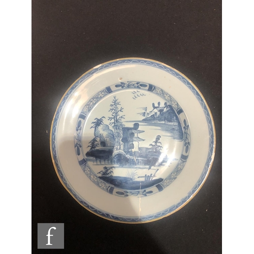 84 - Three assorted 19th Century tin glazed plates decorated in blue and white with Chinoiserie roundels,... 