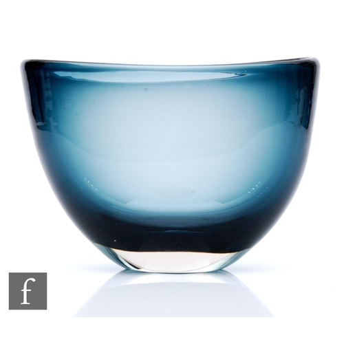 320 - A contemporary Art Glass vase, of compressed ovoid form internally decorated with smoky blue to blac... 