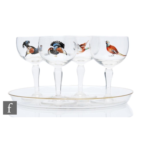 325 - A set of four 1930s clear crystal drinking glasses, the ovoid bowl decorated with stylised hand pain... 