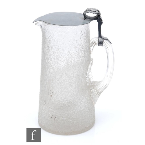 326 - A 19th Century crackle ice jug of tapered form with lower internal ice aperture and thumb mould pewt... 