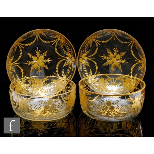 335 - A pair of early 20th Century clear crystal finger bowls and stands circa 1900, possibly Moser, each ... 