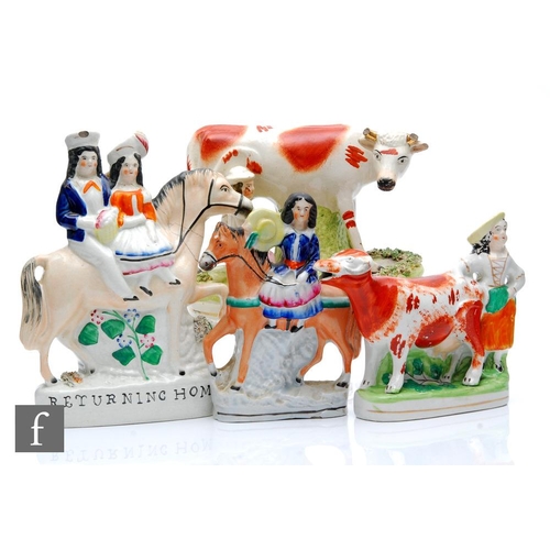 103 - Four 19th Century Staffordshire flatback figures comprising 'Returning Home', two milkmaid spill vas... 