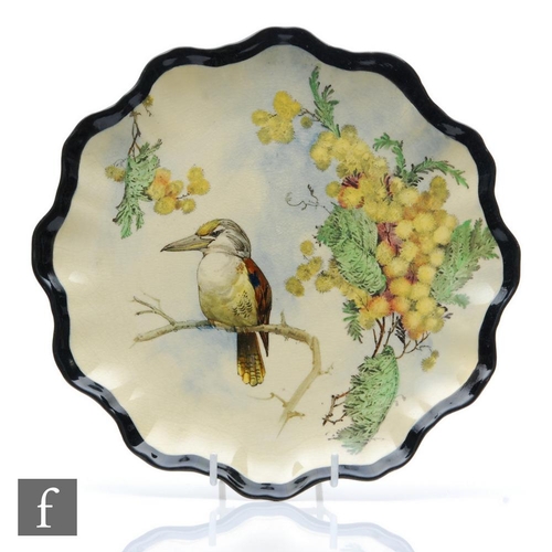 131 - A 1930s Royal Doulton Australian series ware plate decorated with a kookaburra sat on a wattle branc... 