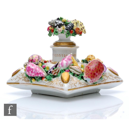 14 - A 19th Century porcelain inkwell decorated with encrusted shells and seaweed with gilt vermicelli se... 
