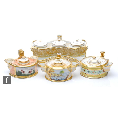 31 - Four assorted 19th Century inkwells of varying form to include a Barr Flight and Barr example with a... 