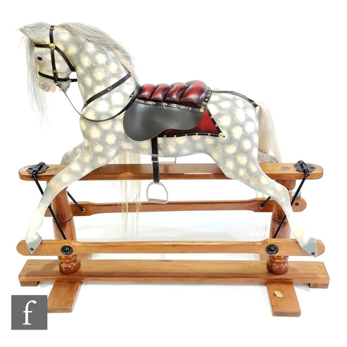 829 - An early 20th Century Lines Brothers Ltd Sportiboy SP3 rocking horse, fully restored, the pine body ... 