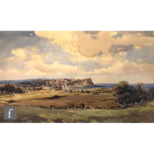 538 - SAM MCLARNON (IRISH, 1923-2013) - A view of Ballycastle, Co. Antrim, watercolour, signed, framed, 28... 