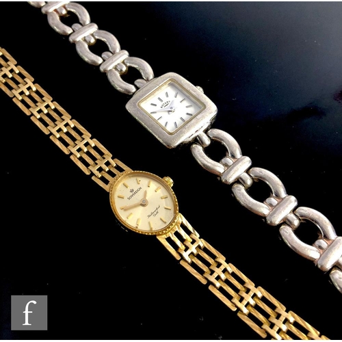 440 - A 9ct gold lady's Sovereign wristwatch on a yellow gold gate bracelet, engraved to reverse, together... 