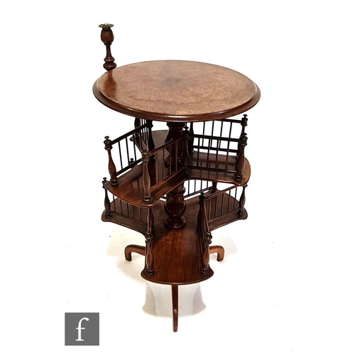 1136 - A Victorian walnut reading or book table, with fitted candle stand over two-tier revolving galleried... 