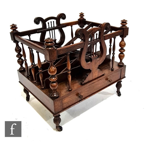 1137 - A 19th Century rosewood four division Canterbury, with lyre shaped end supports above a single friez... 