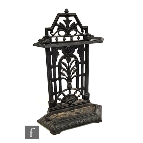 1144 - A late 19th Century cast iron umbrella or stick stand in the manner of Coalbrookdale, with pierced b... 