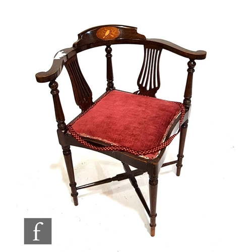 1146 - An Edwardian stained beech corner armchair, the top rail with inlaid cartouche over lyre shaped spla... 