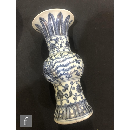 171 - A collection of Chinese blue and white vases, to include a Gu vase with phoenix, height 31cm, a face... 