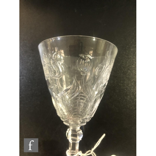 226 - A late 19th Century Stevens & Williams rock crystal style drinking glass, the round funnel bowl ... 