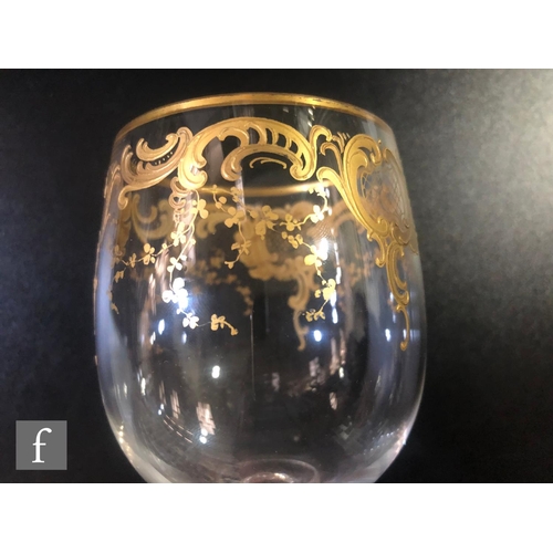 330 - A set of five early 20th Century French crystal wine glasses, possibly Saint Louis, the ovoid bowls ... 