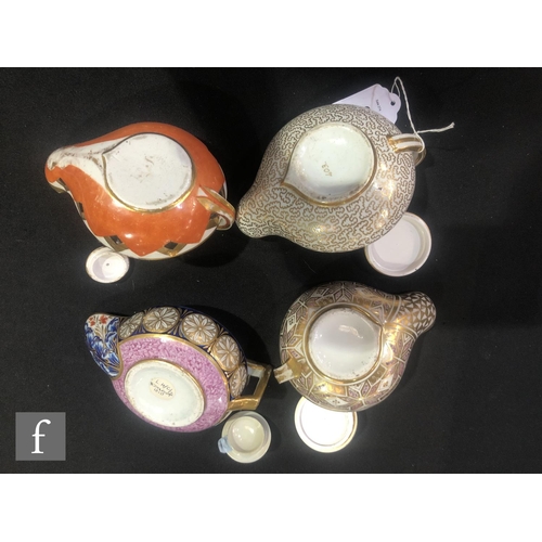 51 - Four 19th Century oil lamps modelled on Roman oil lamps each with gilt and enamel decoration, all un... 