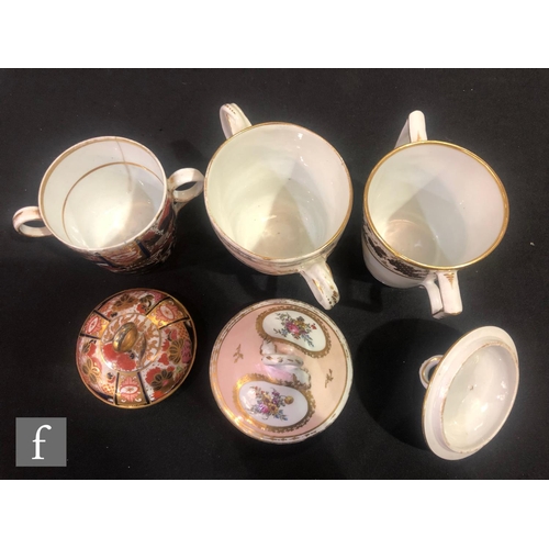56 - Five assorted 19th Century chocolate cups to include a Barr Flight & Barr twin handled cup with ... 