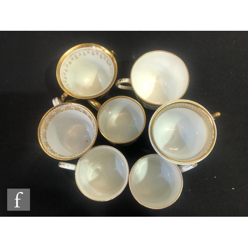 57 - A collection of assorted 19th Century coffee cups, teacups and saucers to include a Barr Worcester s... 