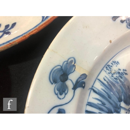 85 - Four 19th Century tin glazed plates of varying form each decorated in blue and white with Chinoiseri... 