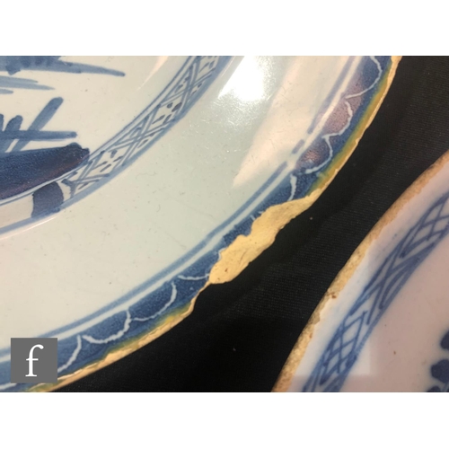 85 - Four 19th Century tin glazed plates of varying form each decorated in blue and white with Chinoiseri... 