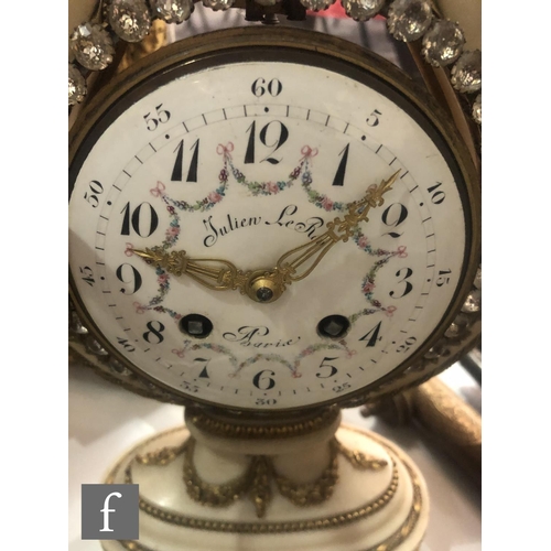 883 - A late 19th Century French lyre shaped Marie Antoinette mantel clock with eight-day movement strikin... 