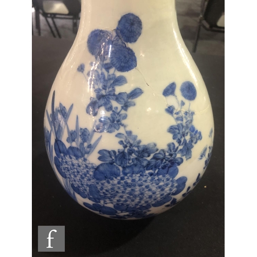 175 - A collection of Japanese blue and white porcelain items, to include a pair of arrow shaped vases, de... 