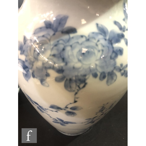 175 - A collection of Japanese blue and white porcelain items, to include a pair of arrow shaped vases, de... 