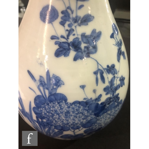 175 - A collection of Japanese blue and white porcelain items, to include a pair of arrow shaped vases, de... 