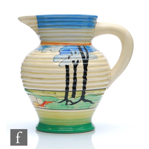 215 - Clarice Cliff - Blue Firs - A shape 564 George shape jug circa 1933, hand painted with a stylised co... 