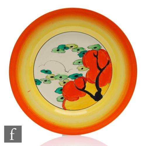 234 - Clarice Cliff - Orange Erin - A large circular plate circa 1934, hand painted to the central well wi... 