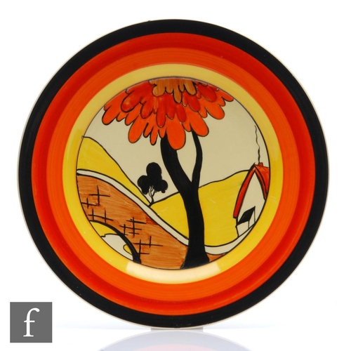 238 - Clarice Cliff - House & Bridge - A large circular plate circa 1932, hand painted with a stylised... 