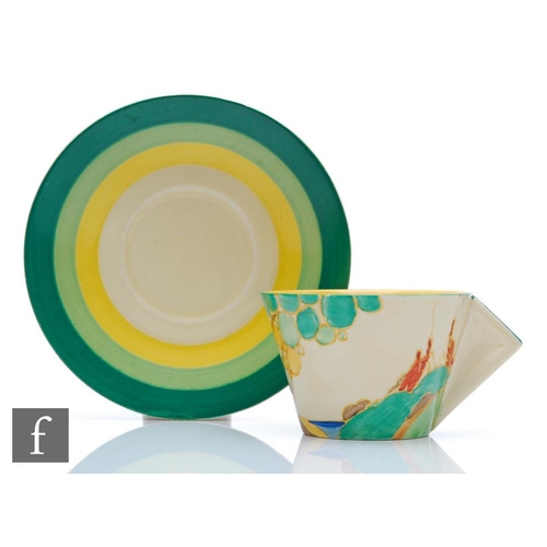 257 - Clarice Cliff - Secrets - A conical shape cup and saucer circa 1933, hand painted with a stylised tr... 