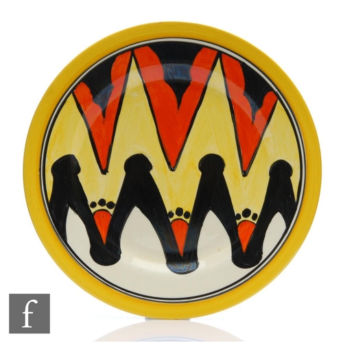 284 - Clarice Cliff - Keyhole variant - A large circular plate circa 1929, hand painted with a banded vari... 