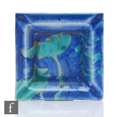 348 - Clarice Cliff - Inspiration Lily - A square shape ashtray circa 1930, hand painted with a stylised w... 