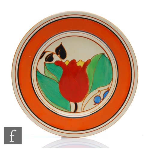 353 - Clarice Cliff - Red Tulip - A large circular plate circa 1930, hand painted with a large tulip bloom... 