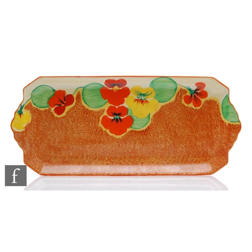 383 - Clarice Cliff - Nasturtium - A large shape 612 sandwich tray circa 1932, hand painted with stylised ... 