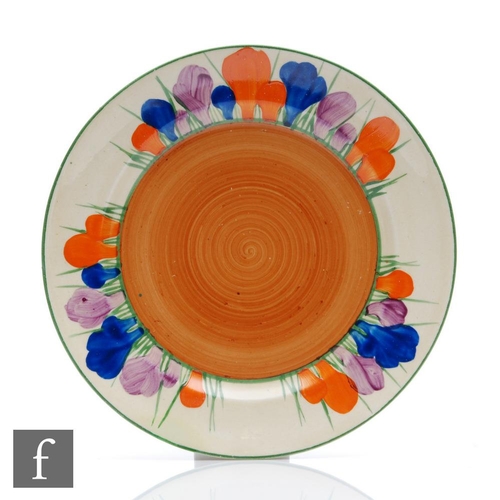 399 - Clarice Cliff - Crocus - A circular side plate circa 1929, radially hand painted with Crocus sprays ... 