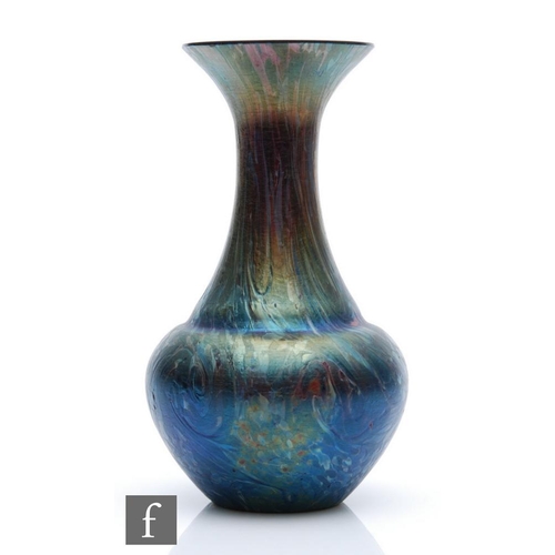 44 - Kralik - An early 20th Century glass vase of low shouldered form with everted collar neck, decorated... 