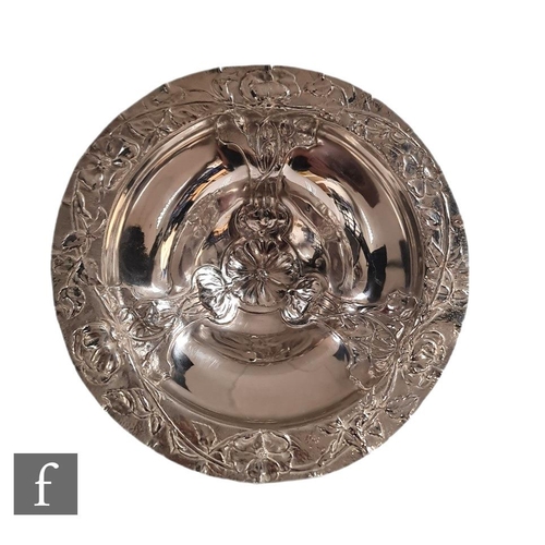 11 - In the manner of WMF - An early 20th Century Secessionist silver plated bowl, the bowl with roses, b... 