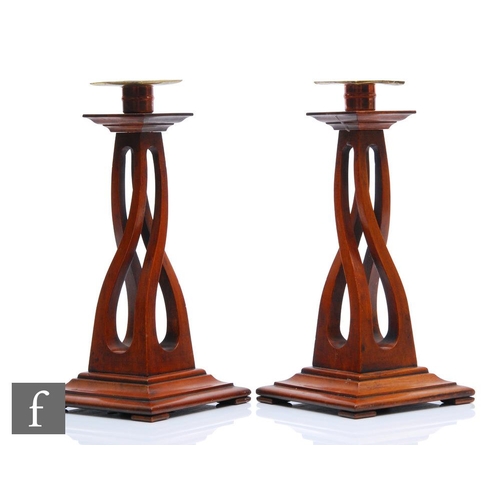 36 - Unknown - A pair of wooden candlesticks in the Secessionist style with wrythen pedestal and copper a... 