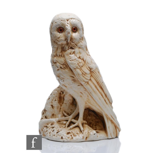 80 - Bretby - A large early 20th Century shape 1317 model of a white owl stood on a rustic base with inse... 