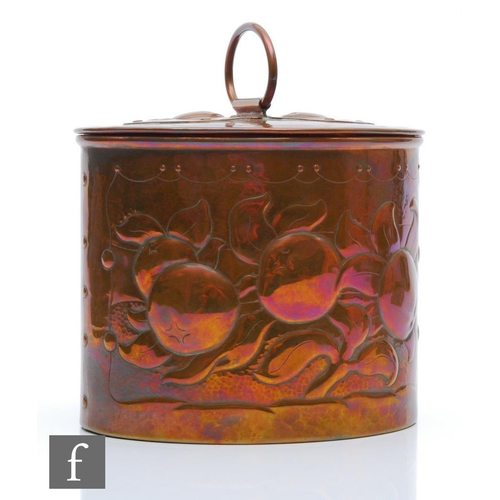 94 - Newlyn - An early 20th Century Arts and Crafts copper tea caddy of oval form decorated with oranges ... 