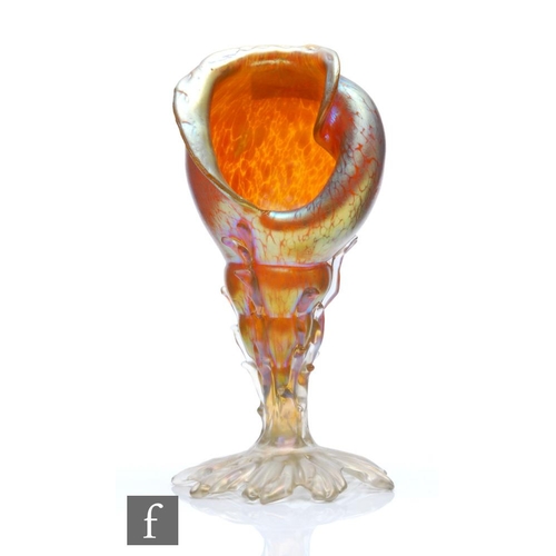 29 - Loetz - An early 20th Century glass vase formed as a conch shell in the Creta Papillon pattern with ... 