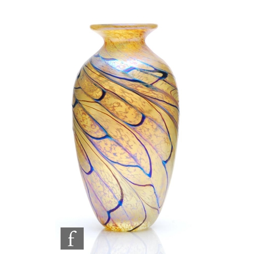 1138 - Okra - A contemporary studio glass vase of ovoid form with everted rom, the entire body in a mottled... 