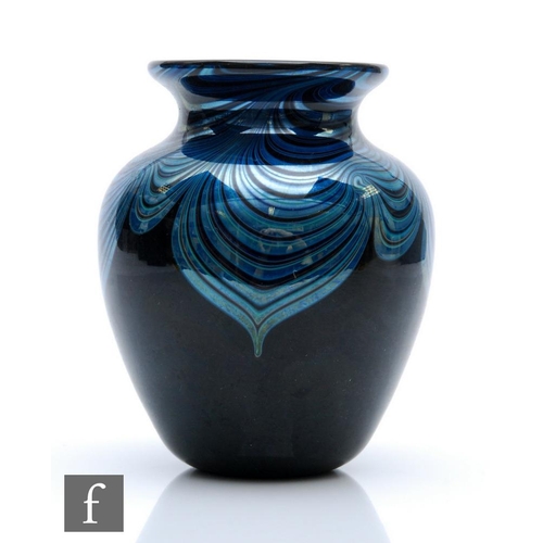 1142 - Okra - A later 20th Century studio glass vase in the Reflection pattern, of ovoid form with everted ... 