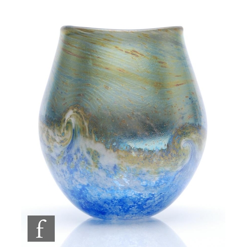 1242 - Norman Stuart Clarke - A later 20th Century studio glass vase in the Seascape pattern, of swollen tu... 